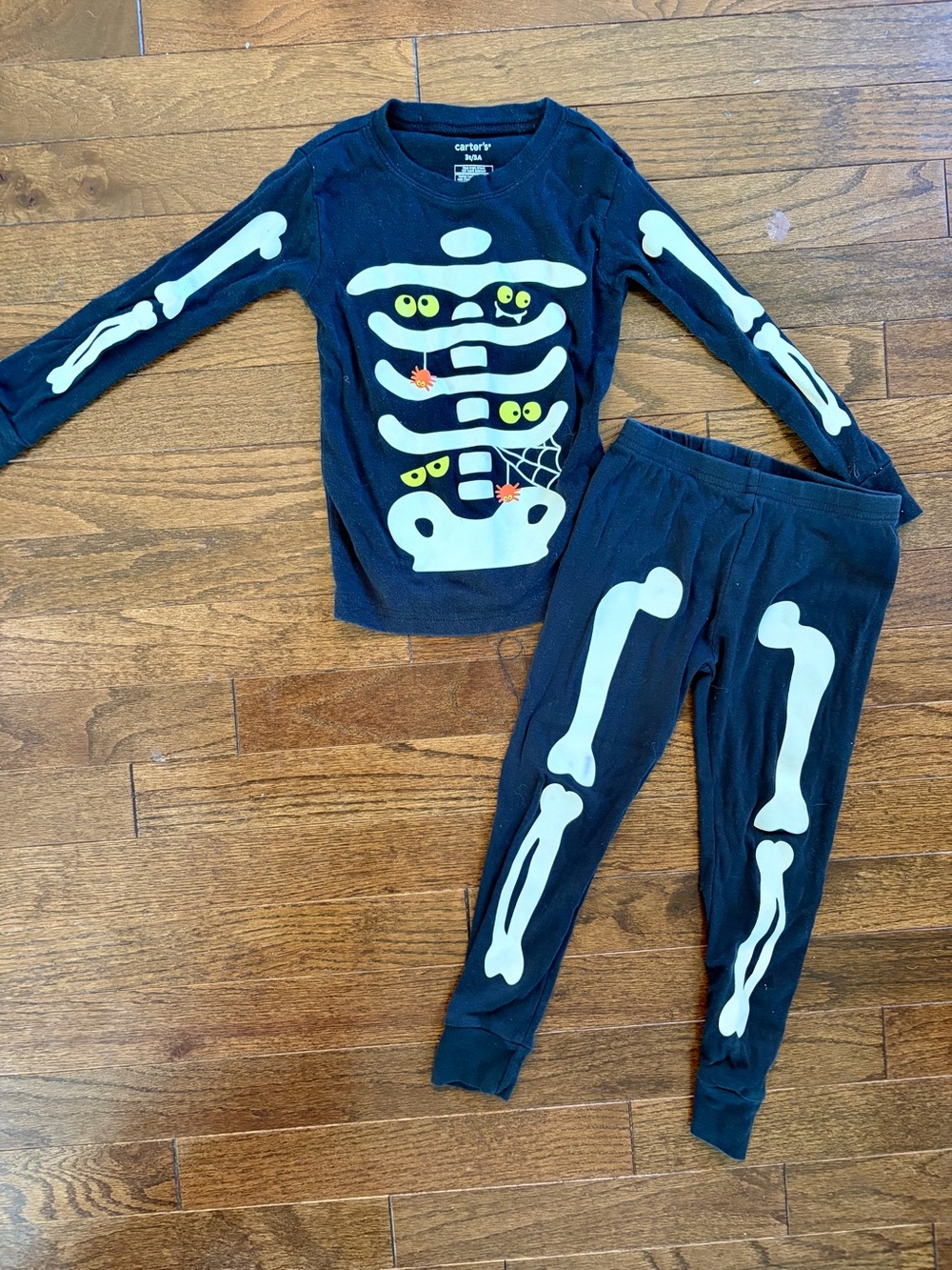 Carter's Black Skeleton Pajama Costume Set with Yellow Eye Accents